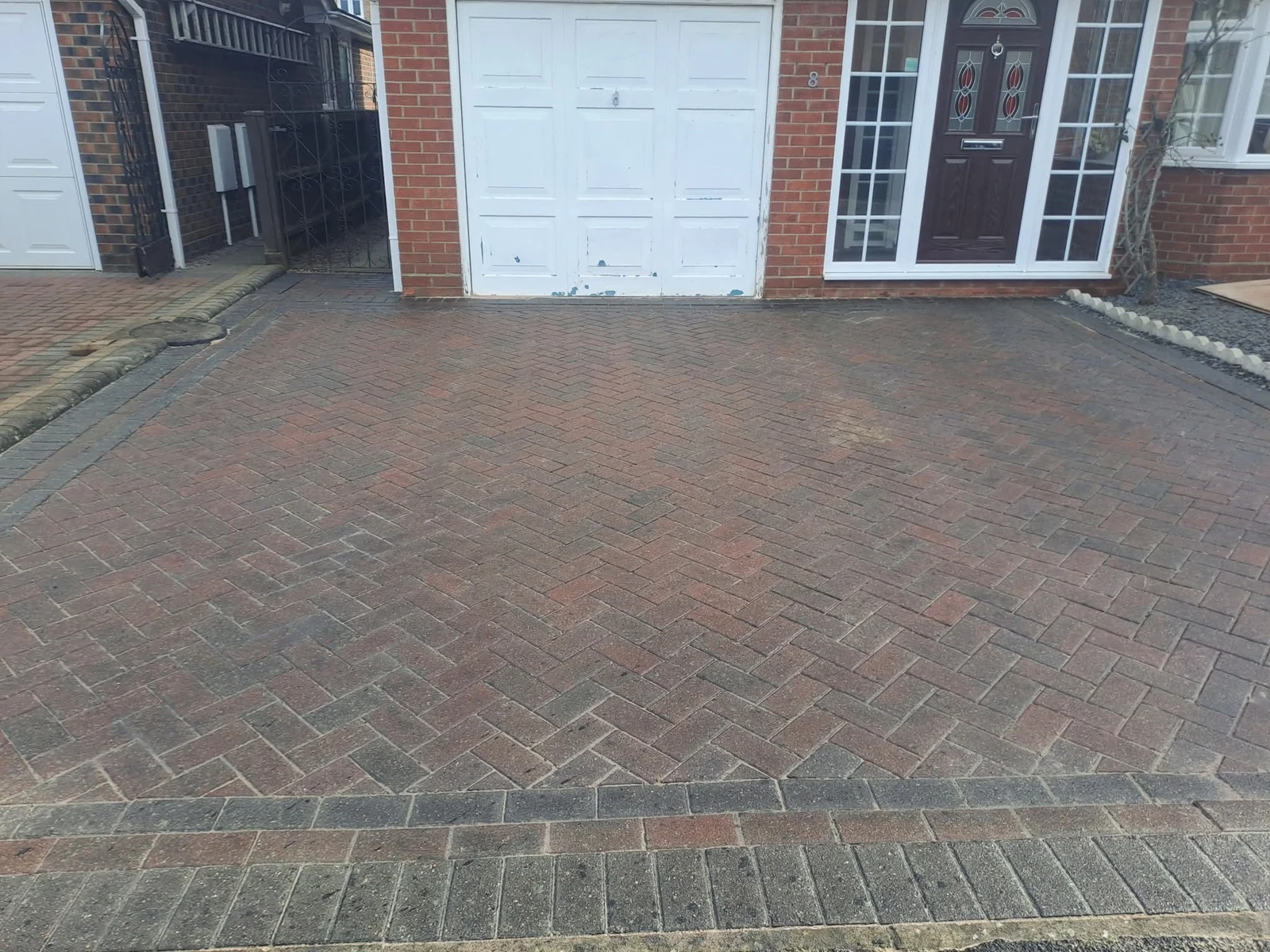 Block paved herringbone driveway after cleaning